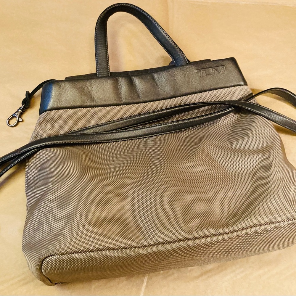 Tumi leather and canvas satchel handles and strap multi interior pockets